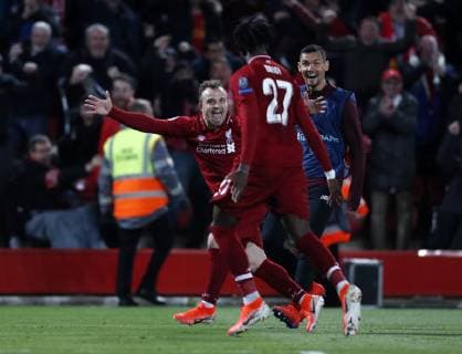 Liverpool s Dejan Lovren celebrates his sides fourth goal during the UEFA Champions League match at Anfield, Liverpool. Picture date: 7th May 2019. Picture credit should read: Darren Staples Sportimage EDITORIAL USE ONLY. No use with unauthorised audio, video, data, fixture lists, club league logos or live services. Online in-match use limited to 120 images, no video emulation. No use in betting, games or single club league player publications. SPI-0072-0062