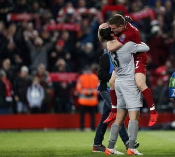 Liverpool s Alisson and James Milner celebrate at the final whistle during the UEFA Champions League match at Anfield, Liverpool. Picture date: 7th May 2019. Picture credit should read: Darren Staples Sportimage EDITORIAL USE ONLY. No use with unauthorised audio, video, data, fixture lists, club league logos or live services. Online in-match use limited to 120 images, no video emulation. No use in betting, games or single club league player publications. SPI-0072-0073