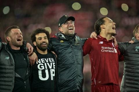 (190508) -- LIVERPOOL, May 8, 2019 (Xinhua) -- Liverpool s Mohamed Salah (2nd, L), manager Jurgen Klopp (2nd, R) and Virgil van Dijk (1st, R) celebrate after the UEFA Champions League Semi-Final second Leg match between Liverpool FC and FC Barcelona Barca at Anfield in Liverpool, Britain on May 7, 2019. Liverpool won 4-3 on aggregate and reached the final. (Xinhua) FOR EDITORIAL USE ONLY. NOT FOR SALE FOR MARKETING OR ADVERTISING CAMPAIGNS. NO USE WITH UNAUTHORIZED AUDIO, VIDEO, DATA, FIXTURE LISTS, CLUB LEAGUE LOGOS OR LIVE SERVICES. ONLINE IN-MATCH USE LIMITED TO 45 IMAGES, NO VIDEO EMULATION. NO USE IN BETTING, GAMES OR SINGLE CLUB LEAGUE PLAYER PUBLICATIONS. (SP)BRITAIN-LIVERPOOL-FOOTBALL-UEFA CHAMPIONS LEAGUE-LIVERPOOL VS FC BARCELONA