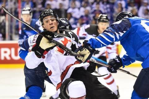 (190511) -- KOSICE, May 11, 2019 -- Kyle Turris (L) of Canada competes during the 2019 IIHF Ice hockey Eishockey World Championship WM Weltmeisterschaft group A game between Finland and Canada at Steel Arena in Kosice, Slovakia, on May 10, 2019. Finland won 3-1. ) (SP)SLOVAKIA-KOSICE-ICE HOCKEY-IIHF-WORLD CHAMPIONSHIP-GROUP A LukaszxLaskowski 