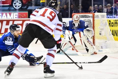 (190511) -- KOSICE, May 11, 2019 -- Kevin Lankinen (R), goalie of Finland watches as Kyle Turris (C) controls the puck during the 2019 IIHF Ice hockey Eishockey World Championship WM Weltmeisterschaft group A game between Finland and Canada at Steel Arena in Kosice, Slovakia, on May 10, 2019. Finland won 3-1. ) (SP)SLOVAKIA-KOSICE-ICE HOCKEY-IIHF-WORLD CHAMPIONSHIP-GROUP A LukaszxLaskowski 