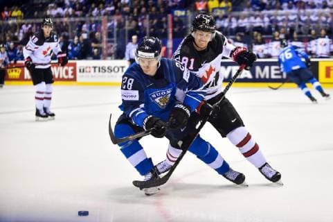 (190511) -- KOSICE, May 11, 2019 -- Henri Jokiharju (L, front) of Finland and Jonathan Marchessault (R, front) of Canada compete for the puck during the 2019 IIHF Ice hockey Eishockey World Championship WM Weltmeisterschaft group A game between Finland and Canada at Steel Arena in Kosice, Slovakia, on May 10, 2019. Finland won 3-1. ) (SP)SLOVAKIA-KOSICE-ICE HOCKEY-IIHF-WORLD CHAMPIONSHIP-GROUP A LukaszxLaskowski 