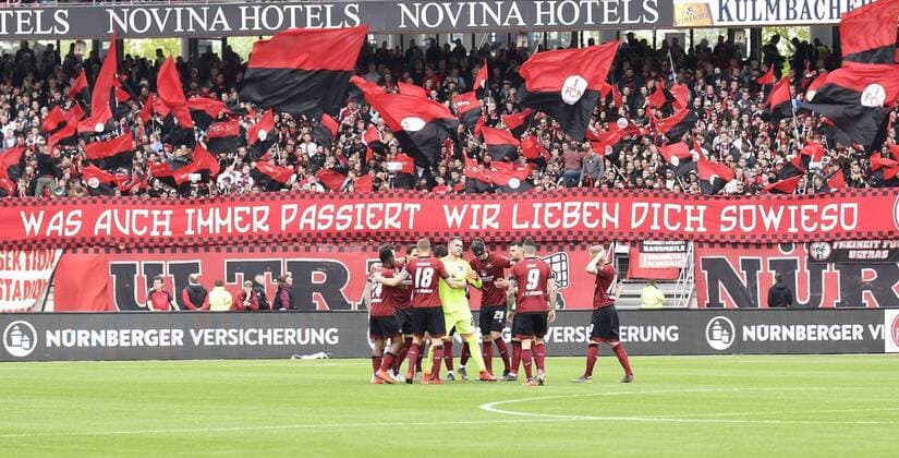 11 05 2019 Soccer Season 2018 2019 1 Soccer Bundesliga 33 Matchday 1 FC Nuremberg Nuremberg FCN Club Borussia Mönchengladbach Gladbach BMG DFL regulations prohibit any use of photographs as image sequences and or quasi video Team FCN Team FCN in front of fans Fanblock banner Fence flag