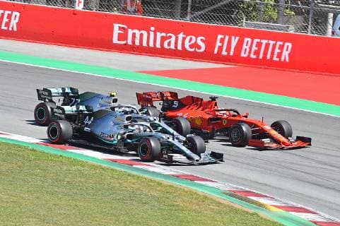 12 05 2019 xekx FIA Formula 1 Grand Prix of Spain 2019 race emspor Start to the race Lewis Hamilton Mercedes AMG Petronas presses inside Valtteri Bottas Mercedes AMG Petronas middle and Sebastian Vettel Ferrari outside past DFL DFB REGULATIONS PROHIBIT ANY USE OF PHOTOGRAPHS as IMAGE SEQUENCES and or QUASI VIDEO Barcelona eel-fotografie Eberhard Krieger
