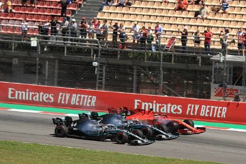 12th May 2019, Circuit de Barcelona-Catalunya, Barcelona, Spain; Formula One Grand Prix of Spain, race day; Mercedes AMG Petronas Motorsport, Lewis Hamilton, team mate Valtteri Bottas and Scuderia Ferrari, Sebastian Vettel go three wide down to turn 1  ActionPlus12134239 Octane
