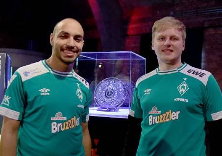 12.05.2019, xlakx, Esports VBL, Grand Final - in Berlin 2019 emspor, v.l.die Finallisten Mohammed MoAuba Harkous (Playstation4),SV Werder Bremen,Michael MegaBit Bittner (Xbox),SV Werder Bremen,steht beim Grand Final der Virtual Bundesliga (VBL) im Westhafen Event & Convention Center. Die 24 besten Spieler Deutschlands kämpfen aufgeteilt in vier Gruppen auf Xbox und Playstation um den Titel. (DFL DFB REGULATIONS PROHIBIT ANY USE OF PHOTOGRAPHS as IMAGE SEQUENCES and or QUASI-VIDEO) Berlin *** 12 05 2019 xlakx Esports VBL Grand Final in Berlin 2019 emspor v l the finalists Mohammed MoAuba Harkous Playstation4 SV Werder Bremen Michael MegaBit Bittner Xbox SV Werder Bremen is in the Grand Final of the Virtual Bundesliga VBL in the Westhafen Event Convention Center Germanys 24 best players fight in four groups on Xbox and Playstation for the title DFL DFB REGULATIONS PROHIBIT ANY USE OF PHOTOGRAPHS as IMAGE SEQUENCES and or QUASI VIDEO Berlin