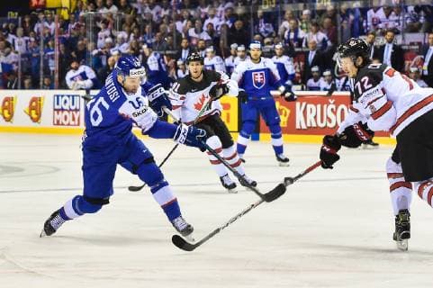 (190514) -- KOSICE, May 14, 2019 -- Robert Lantosi (L) of Slovakia shoots during the 2019 IIHF Ice hockey Eishockey World Championship WM Weltmeisterschaft group A game between Slovakia and Canada at Steel Arena in Kosice, Slovakia, May 13, 2019. Canada won 6-5. ) (SP)SLOVAKIA-KOSICE-ICE HOCKEY-IIHF-WORLD CHAMPIONSHIP-GROUP A-CAN VS SVK LukaszxLaskowski 