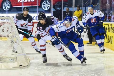 (190514) -- KOSICE, May 14, 2019 -- Brandon Montour (2nd L) of Canada vies with Robert Lantosi (2nd R) of Slovakia during the 2019 IIHF Ice hockey Eishockey World Championship WM Weltmeisterschaft group A game between Slovakia and Canada at Steel Arena in Kosice, Slovakia, May 13, 2019. Canada won 6-5. ) (SP)SLOVAKIA-KOSICE-ICE HOCKEY-IIHF-WORLD CHAMPIONSHIP-GROUP A-CAN VS SVK LukaszxLaskowski 