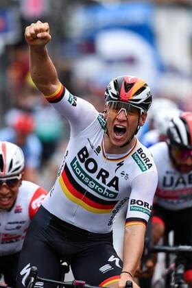 Pascal Ackermann GER BORA hansgrohe wins his first Grand Tour stage at the Giro d Italia 2019 and Rudi Ruediger Selig GER BORA hansgrohe is delighted to cross the finish line Finish Finish Sprint Finish Arrival Finale Final Sprint Jubilation Joy Luck Emotion Emotions Mimic Mimic Gestic Gestictics action racing scene portrait portrait vertical vertical event event event 102 Giro d Italia 2 stage stage 2 20190512 stage 2 Bologna to Fucecchio 205 0 km place location Fucecchio region province Florence Country Italy Italy Italia date date 12 05 2019 Cycling 102 Giro d Italia 2 stage 12 05 2019
