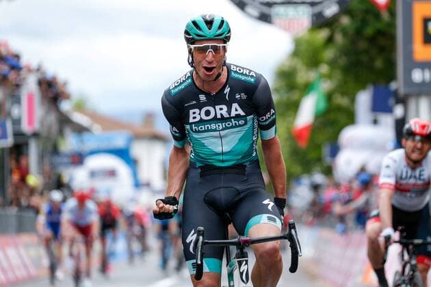 Pascal Ackermann GER BORA hansgrohe wins his first Grand Tour stage at the Giro d Italia 2019 and Rudi Ruediger Selig GER BORA hansgrohe is delighted to cross the finish line Finish Finish Sprint Finish Arrival Finale Final Sprint Jubilation Joy Luck Emotion Emotions Mimic Mimic Gestic Gestictics action racing scene landscape horizontal event event event 102 Giro d Italia 2 stage stage 2 20190512 stage 2 Bologna to to Fucecchio 205 0 km place location Fucecchio region province Florence Country Italy Italy Italia Date Date 12 05 2019 Cycling Cycling 102 Giro d Italia 2 stage 12 05 2019