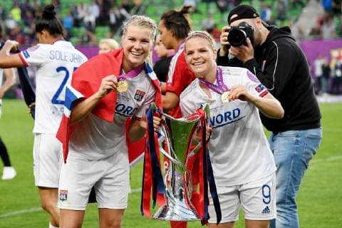 (L-R) Ada Hegerberg of Olympique Lyonnais women, Eugenie Le Sommer of Olympique Lyonnais women with UEFA Womens Champions League trophy during the UEFA Women s Champions League final match between Olympique Lyonnais women v FC Barcelona, Barca women on May 18, 2018 at Ferencvaros Stadium in Budapest, Hungary UEFA Women s Champions League 2018 2019 xVIxVIxImagesx xGerritxvanxKeulenxIVx 14497347