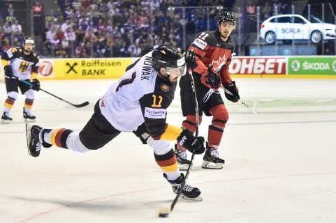 (190519) -- KOSICE, May 19, 2019 -- Marco Nowak (front) of Germany takes a shot on goal during the 2019 IIHF Ice hockey, Eishockey World Championship, WM, Weltmeisterschaft Slovakia group A game between Canada and Germany at Steel Arena on May 18, 2019 in Kosice, Slovakia. Canada won 8-1. ) (SP)SLOVAKIA-KOSICE-ICE HOCKEY-IIHF-WORLD CHAMPIONSHIP-GROUP A-CAN VS GER LukaszxLaskowski 