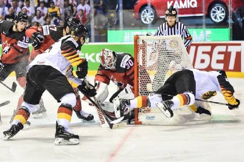 (190519) -- KOSICE, May 19, 2019 -- Matt Murray (4th L), goalie of Canada tackles Dominik Kahun (1st R) of Germany during the 2019 IIHF Ice hockey, Eishockey World Championship, WM, Weltmeisterschaft Slovakia group A game between Canada and Germany at Steel Arena on May 18, 2019 in Kosice, Slovakia. Canada won 8-1. ) (SP)SLOVAKIA-KOSICE-ICE HOCKEY-IIHF-WORLD CHAMPIONSHIP-GROUP A-CAN VS GER LukaszxLaskowski 