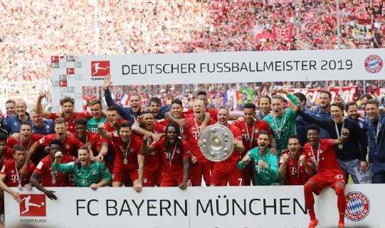 FC Bayern Munich becomes German Champion for the 7th time in a row against Eintracht Frankfurt FC Bayern is German Football Champion of the season 2018 2019 Team picture FC Bayern German Champion Munich Bayern Germany Allianz Arena