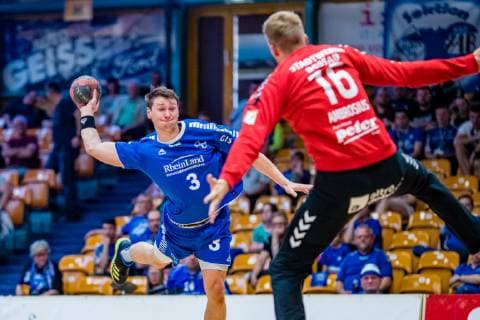 Joshua Reiland 3 TSV Bayer Dormagen , Philip Ambrosius 16 Dessau Rosslauer HV 06 during the match in the Handball 2 Bundesliga Mens Season 2018 2019 between Dessau Rosslauer HV 06 and TSV Bayer Dormagen in the Anhalt Arena on 19 May 2019 in Dessau Rosslau, Saxony Anhalt, Germany