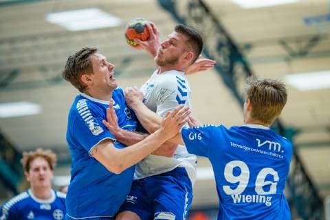 Daniel Zele 28 Dessau Rosslauer HV 06 on the ball, Tim Wieling 96 TSV Bayer Dormagen during the match in the Handball 2 Bundesliga Men Season 2018 2019 between Dessau Rosslauer HV 06 and TSV Bayer Dormagen in the Anhalt Arena on 19 May 2019 in Dessau Rosslau, Saxony Anhalt, Germany