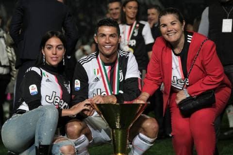 Georgina Rodriguez, Cristiano Ronaldo of Juventus and his mother Maria Dolores dos Santos Aveiro pose with the championship trophy Torino 19-05-2018 Allianz Stadium Football Serie A 2018 2019 Juventus - Atalanta photo One Nine Insidefoto onexnine