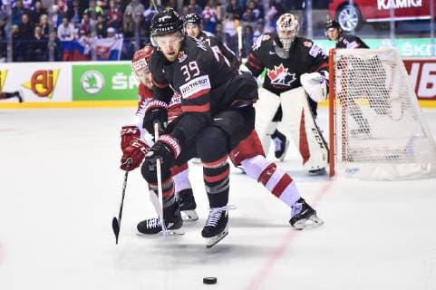 (190521) -- KOSICE, May 21, 2019 -- Nicklas Jensen (1st L) of Denmark tackles Anthony Mantha (front) of Canada during the 2019 IIHF Ice hockey, Eishockey World Championship, WM, Weltmeisterschaft Slovakia group A game between Canada and Denmark at Steel Arena in Kosice, Slovakia, on May 20, 2019. Canada won 5-0. ) (SP)SLOVAKIA-KOSICE-ICE HOCKEY-IIHF-WORLD CHAMPIONSHIP-GROUP A-CAN-DEN LukaszxLaskowski 
