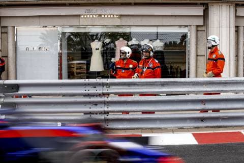 Motorsports: FIA Formula One World Championship, WM, Weltmeisterschaft 2019, Grand Prix of Monaco, Track marshals in front of a Miu Miu store Monte Carlo Monaco