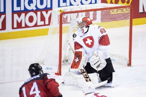 190523 Adam Henrique of Canada shoots against goaltender Leonardo Genoni of Switzerland during the 2019 IIHF Ice Hockey World Championship quarterfinal game between Canada and Switzerland on May 23, 2019 in Kosice Photo Joel Marklund BILDBYRAN kod JM 87956,  Copyright: JOELxMARKLUND BB190523JM019