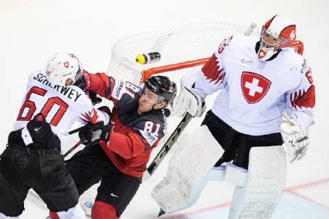 190523 Tristan Scherwey of Switzerland in a fight with Jonathan Marchessault of Canada during the 2019 IIHF Ice Hockey World Championship quarterfinal game between Canada and Switzerland on May 23, 2019 in Kosice Photo Joel Marklund BILDBYRAN kod JM 87956,  Copyright: JOELxMARKLUND BB190523JM029
