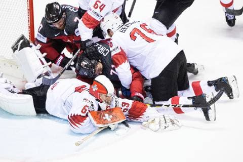 190523 Sean Couturier and Anthony Cirelli of Canada in action against goaltender Leonardo Genoni of Switzerland during the 2019 IIHF Ice Hockey World Championship quarterfinal game between Canada and Switzerland on May 23, 2019 in Kosice Photo Joel Marklund BILDBYRAN kod JM 87956,  Copyright: JOELxMARKLUND BB190523JM031