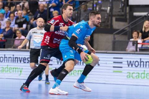 Stuttgart, Germany 23 May 2019 HBL 18 19 TVB 1898 Stuttgart vs SG Flensburg Handewitt v left in duel Rasmus Lauge Schmidt Flensburg und Dominik Weiss Stuttgart Stuttgart Stuttgart Porsche Arena Baden Württemberg Germany