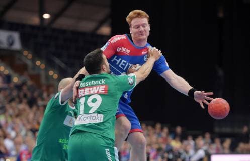 Nicolai Theilinger Erlangen 3 vs. Bastian Roscheck DHfK 19 at the game SC DHfK Leipzig vs. HC Erlangen, Handball, 1 League, 23 05 19 SC DHfK Leipzig vs. HC Erlangen, Handball, 1 League, 23 05 19 Leipzig Copyright: xEIBNER ChristianxModlax EP_CMA