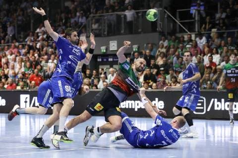 Zeljko Musa SC Magdeburg vs. Florian Baumgärtner re and Stanislav Zhukov VfL Gummersbach Handball Bundesliga Season 2018 2019 Points SC Magdeburg vs. VfL Gummersbach in the GETEC Arena in Magdeburg Action,Germany, Handball, Men,23 05 2019