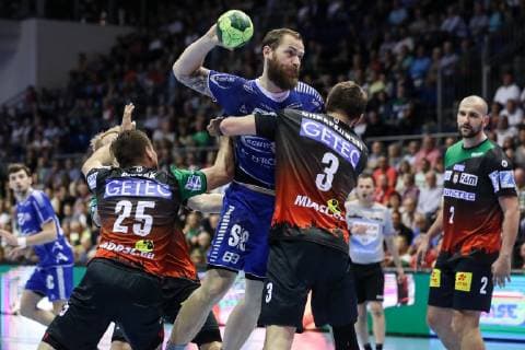 Moritz Preuss VfL Gummersbach vs. Marko Bezjak li and Piotr Chrapkowski SC Magdeburg Handball Bundesliga Season 2018 2019 Points SC Magdeburg vs. VfL Gummersbach in the GETEC Arena in Magdeburg Action,Germany, Handball, Men,23 05 2019