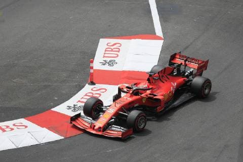 Sebastian Vettel, Ferrari, in the Ste Devote curve, Formula 1 Grand Prix in the Principality of Monaco, Cote d Azur, Mediterranean Sea