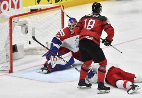 From left Czech goalie PATRIK BARTOSAK receives a goal from PIERRE-LUC DUBOIS of Canada during the Ice hockey, Eishockey World Championships semifinal match between Czech Republic and Canada in Bratislava, Slovakia, Saturday, May 25, 2019. (CTKxPhoto VitxSimanek) CTKPhotoP201905250540001  _VI29503