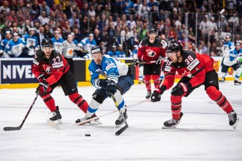 190526 Shea Theodore and Anthony Mantha of Canada against Juho Lammikko of Finland during the 2019 IIHF Ice Hockey World Championship gold medal game between Canada and Finland on May 26, 2019 in Bratislava Photo Joel Marklund BILDBYRAN kod JM 87962,  Copyright: JOELxMARKLUND BB190526JM059
