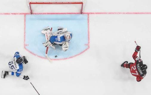 190526 Shea Theodore of Canada celebrates after scoring 1 0 while Atte Ohtamaa and goaltender Kevin Lankinen of Finland look dejected during the 2019 IIHF Ice Hockey World Championship gold medal game between Canada and Finland on May 26, 2019 in Bratislava Photo Joel Marklund BILDBYRAN kod JM 87962,  Copyright: JOELxMARKLUND BB190526JM069