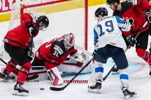 BRATISLAVA, SLOVAKIA - MAY 26, 2019: Canada s Adam Henrique, goalie Matt Murray and Finland s Veli-Matti Savinainen (L-R) in their 2019 IIHF Ice hockey, Eishockey World Championship, WM, Weltmeisterschaft Gold medal match at Ondrej Nepela Arena. Alexander Demianchuk TASS  TS0ACE1F