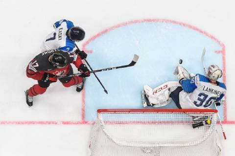 190526 Dylan Strome of Canada against Oliwer Kaski and goaltender Kevin Lankinen of Finland during the 2019 IIHF Ice Hockey World Championship gold medal game between Canada and Finland on May 26, 2019 in Bratislava Photo Joel Marklund BILDBYRAN kod JM 87962,  Copyright: JOELxMARKLUND BB190526JM077