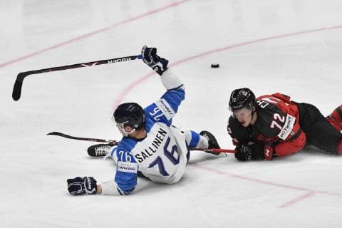 Eishockey WM, Finale, Kanada - Finnland From left JERE SALLINEN of Finland and THOMAS CHABOT of Canada in action during the Ice hockey, Eishockey World Championships gold medal match at the Ondrej Nepela Arena in Bratislava, Slovakia, Sunday, May 26, 2019. (CTKxPhoto VitxSimanek) CTKPhotoP201905260737001  _VIS3697