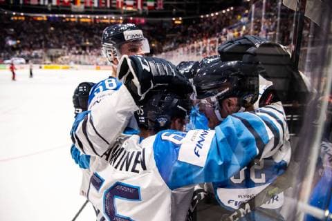 190526 Harri Pesonen of Finland celebrate with Jani Hakanpää and Sakari Manninen after 1 3 during the 2019 IIHF Ice Hockey World Championship gold medal game between Canada and Finland on May 26, 2019 in Bratislava Photo Joel Marklund BILDBYRAN kod JM 87962,  Copyright: JOELxMARKLUND BB190526JM098