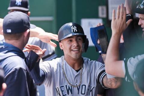 May 26, 2019: New York Yankees shortstop Gleyber Torres (25) celebrates scoring a run with his teammates during an American League game between the New York Yankees and the Kansas City Royals held at Kaufmann Stadium in Kansas City, MO CSM MLB, Baseball Herren, USA 2019: Yankees vs Royals May 26 - ZUMAc04_ 20190526_zaf_c04_207 Copyright: xRichardxUlreichx