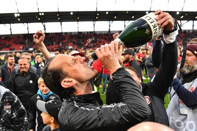 Coach Ruediger REHM WI celebrates the promotion to the 2 league with a sip from the Schampus bottle Jubel, joy, enthusiasm, football 2 Bundesliga FC Ingolstadt SV Wehen Wiesbaden 2 3 Relegation, league 2, season 2018 19 on 28 05 2019 AUDI SPORTPARK, DFL REGULATIONS PROHIBIT ANY USE OF PHOTOGRAPHS ASAGE SEQUENCES AND OR QUASI VIDEO