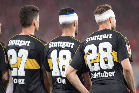 Mario GOMEZ li , S , Ozan KABAK S and Holger BADSTUBER S stand in the wall, bandage around the head, head bandage, bleeding, injured, injury, half figure, half figure, landscape format, football 1 Bundesliga, relegation, Union Berlin Union VfB Stuttgart S 0 0 on 27 05 2019 in Berlin Germany DFL regulations prohibit any use of photographs as image sequences and or quasi video Â