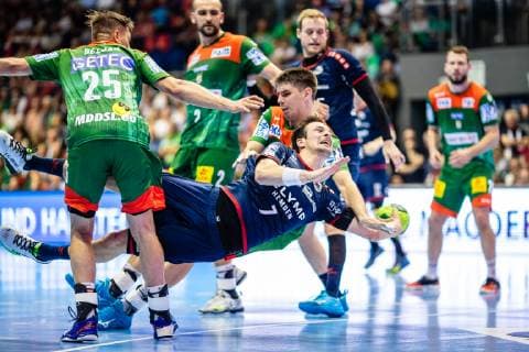Dominik Claus 7 SG BBM Bietigheim on ball, Piotr Chrapkowski 3 SC Magdeburg during the 2018 2019 season in the 1 Handball Bundesliga Men between SC Magdeburg and SG BBM Bietigheim in the GETEC Arena on 29 May 2019 in Magdeburg, Sachsen Anhalt, Germany