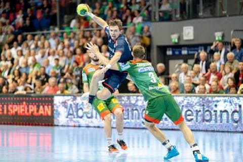 Jan Asmuth Nr 23 SG BBM Bietigheim is fouled in the air by Piotr Chrapkowski Nr 3 SC Magdeburg SC Magdeburg vs SG BBM Bietigheim SC Magdeburg vs SG BBM Bietigheim, Handball, DKB Handball Bundesliga, season 2018 2019, 29 05 2019 Magdeburg Copyright: xDanielxReinelt xEibner-Pressefotox EP_drt