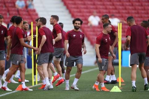 Liverpool Training The Liverpool players warm up during the Liverpool Training session at the Wanda Metropolitano Stadium, Madrid Content Not Available For UK Newspapers Copyright: xPaulxChestertonx FIL-13308-0018