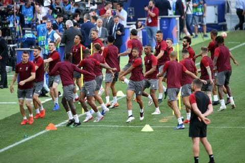 Liverpool Training The Liverpool players warm up during the Liverpool Training session at the Wanda Metropolitano Stadium, Madrid Content Not Available For UK Newspapers Copyright: xPaulxChestertonx FIL-13308-0024