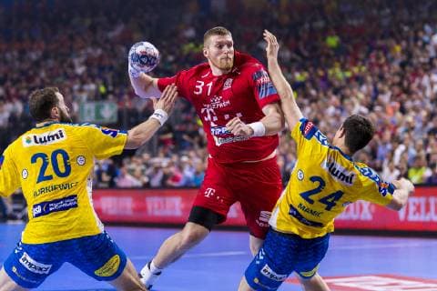 Cologne, Germany 01 June 2019 Handball EHF CL Semifinal Telekom Veszprem HC vs PGE Vive Kielce v li Mariusz Jurkiewicz Kielce , Blaz Blagotinsek Veszprem , Marko Mamic Kielce Köln Lanxess Arena Germany
