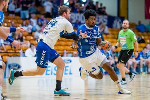 Dieudonne Mubenzem 22 TV 05 07 Huettenberg , Florian Pfeiffer 14 Dessau Rosslauer HV 06 during the match in the Handball 2 Bundesliga mens season 2018 2019 between Dessau Rosslauer HV 06 and TV 05 07 Hüttenberg in the Anhalt Arena on 1 June 2019 in Dessau Rosslau, Saxony Anhalt, Germany