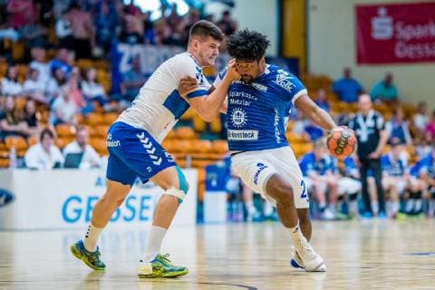 Dieudonne Mubenzem 22 TV 05 07 Huettenberg on the ball, Philip Jungemann 21 Dessau Rosslauer HV 06 during the match in the Handball 2 Bundesliga Mens Season 2018 2019 between Dessau Rosslauer HV 06 and TV 05 07 Hüttenberg in the Anhalt Arena on 1 June 2019 in Dessau Rosslau, Saxony Anhalt, Germany