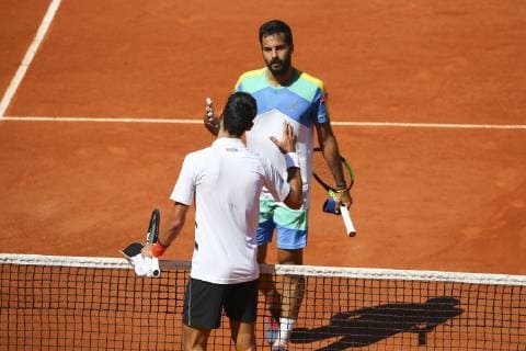 Novak Djokovic (SRB) et Salvatore Caruso (ITA) TENNIS : Internationaux de France 2019 Roland Garros - 01 06 2019 GwendolineLeGoff Panoramic 