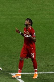 Liverpool s forward Divock Origi celebrates after scoring the 0-2 during the UEFA Champions League final between Tottenham Hotspur and Liverpool FC at Wanda Metropolitano stadium in Madrid, Spain, 01 June 2019. UCL Final 2019 - Tottenham Hotspur vs Liverpool FC !ACHTUNG: NUR REDAKTIONELLE NUTZUNG!  Copyright: xJuanxCarlosxHidalgox GRAF2301 20190601-636950267682280477